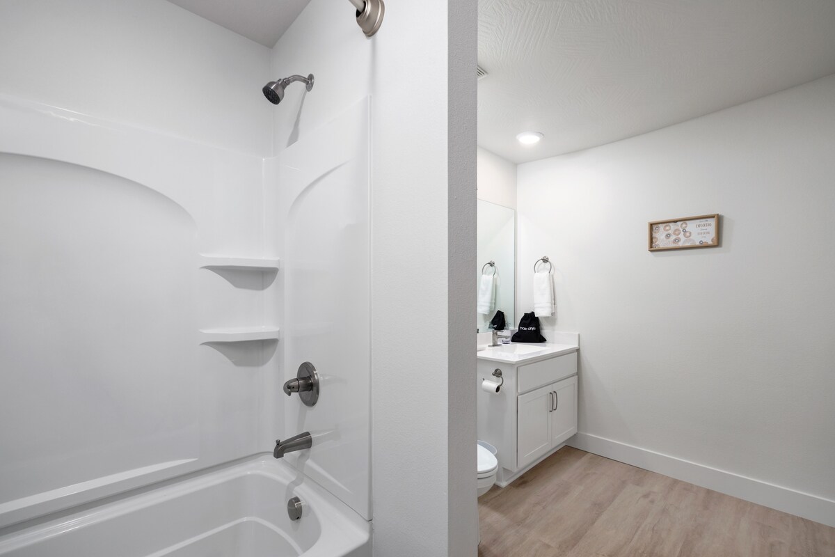Large bathroom with tub and shower