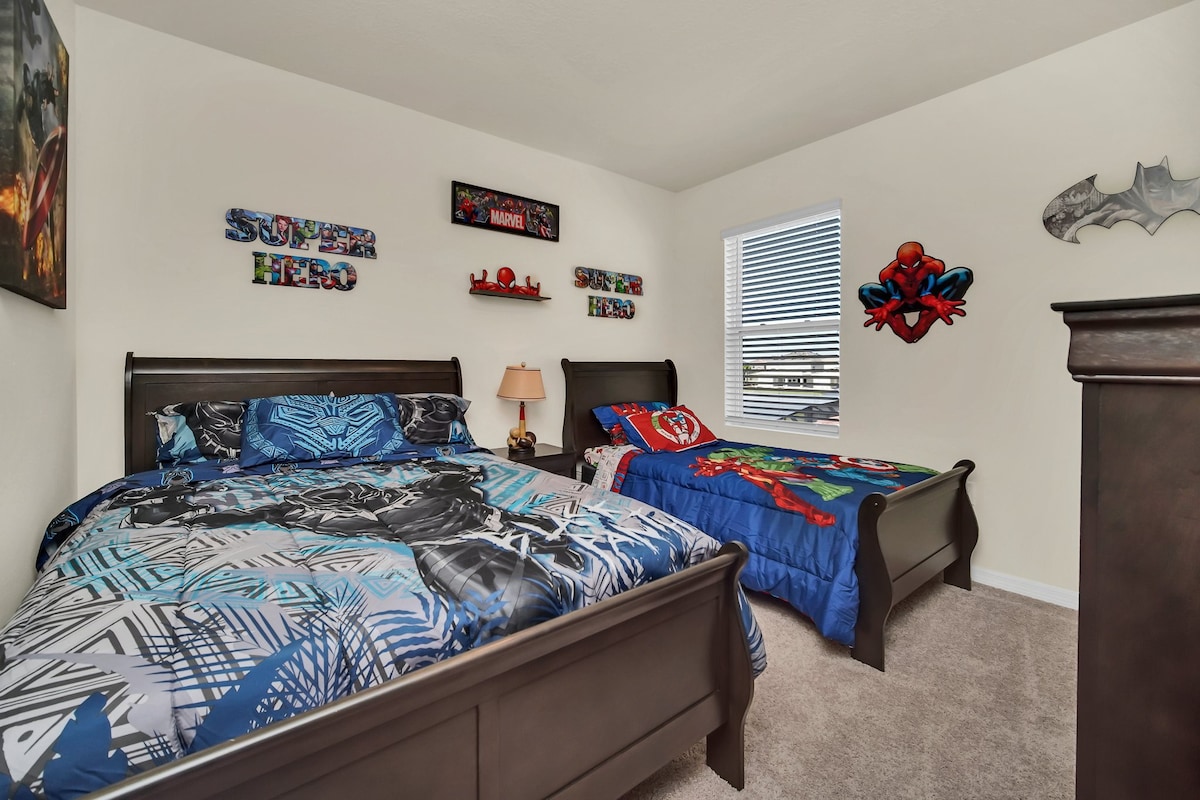 Unleash your inner hero in this vibrant superhero-themed bedroom, perfect for young adventurers to dream big.