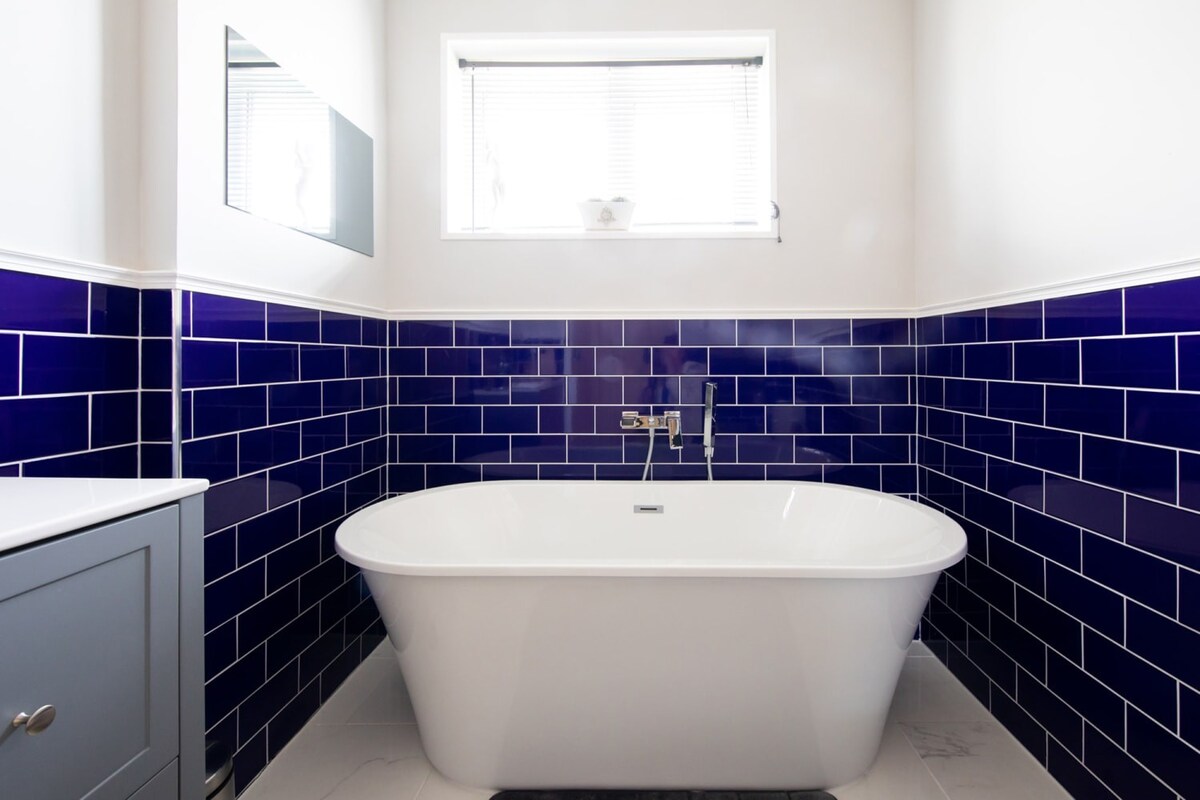 Relax in the large roll top bath in the main bathroom