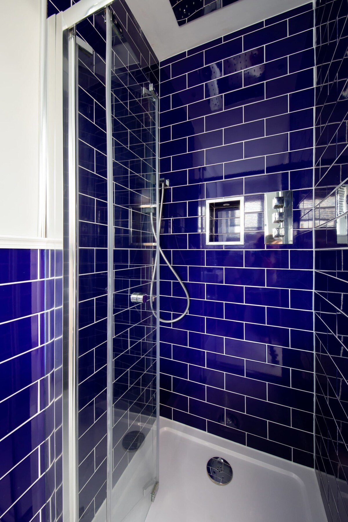 There are two full bathrooms in the home. The first one comes with a modern stand alone shower