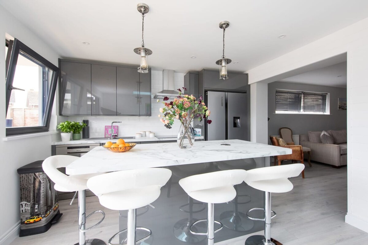 The kitchen island seats up to 4. Relax with a couple of drinks while food is cooking