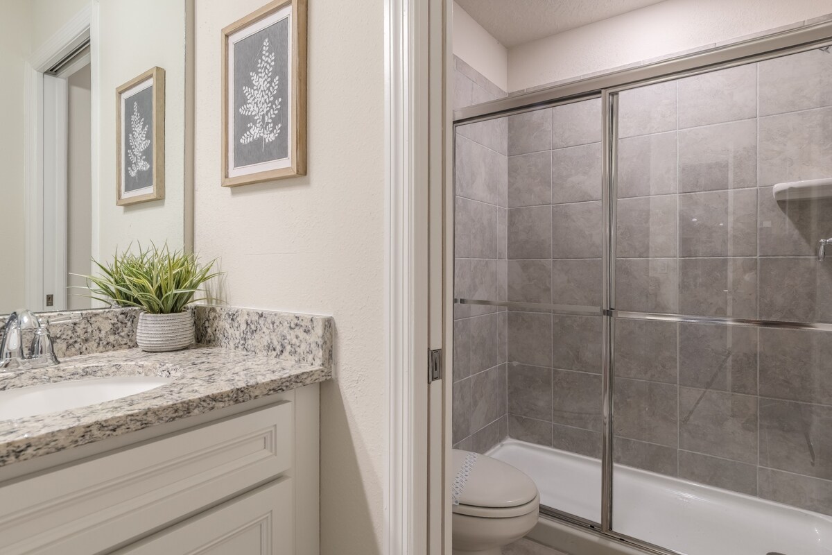 Stand-up shower provides a sleek, easy refresh option.