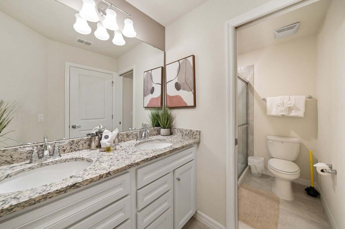 Full bathroom attached to a bedroom offers privacy and comfort.