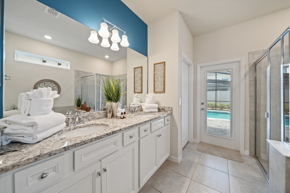 Full bathroom attached to a bedroom creates a private retreat feel.