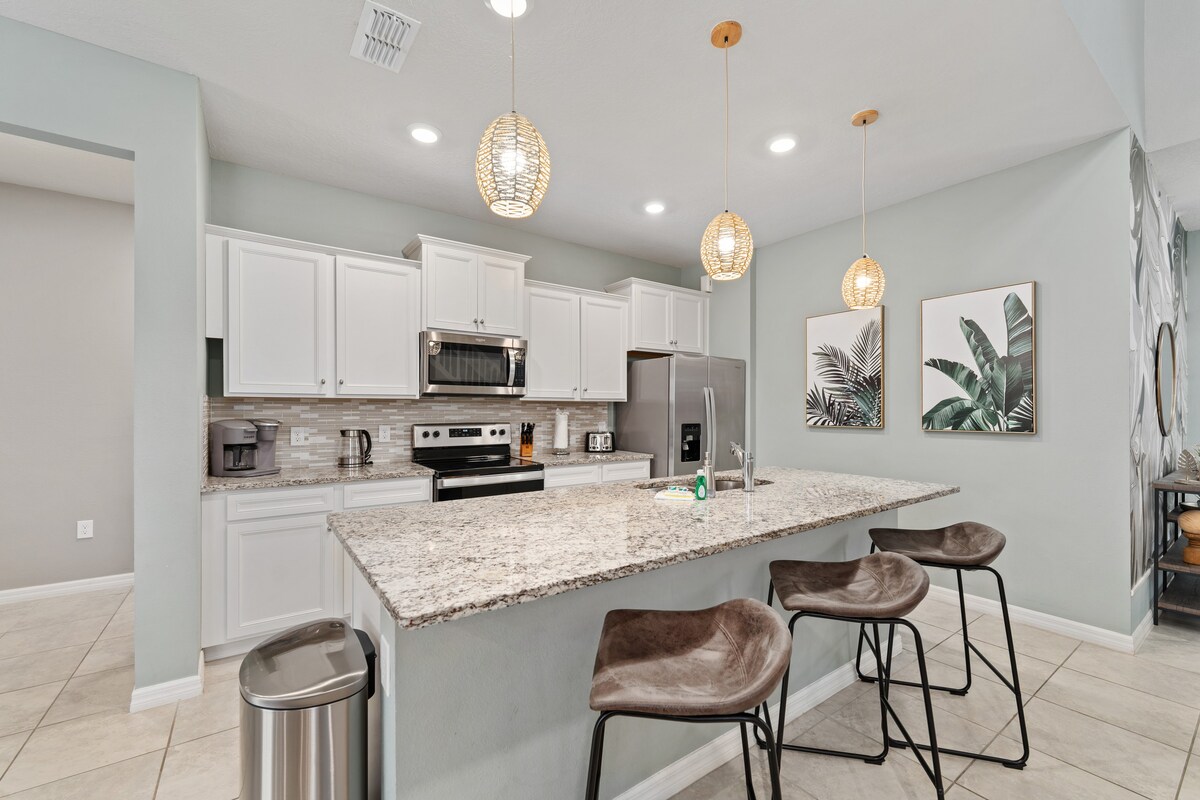 Open-concept full-size kitchen makes cooking and gathering effortless.