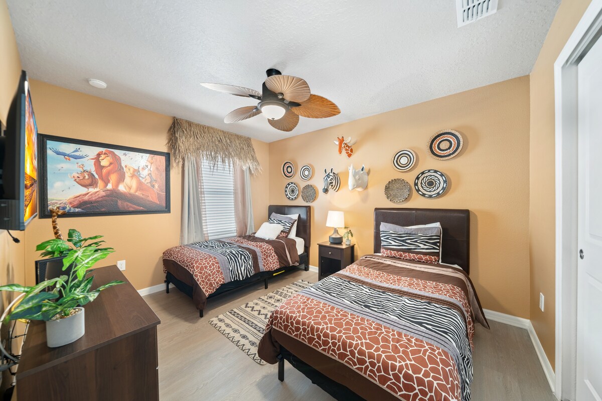 Upstairs bedroom offers a calm retreat w/ cozy bed and soft, neutral décor.