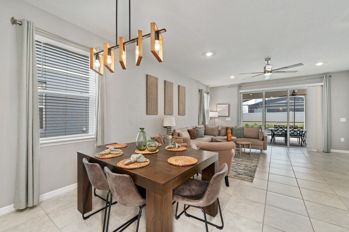 Bright dining area connects seamlessly to the downstairs living space for easy gatherings.