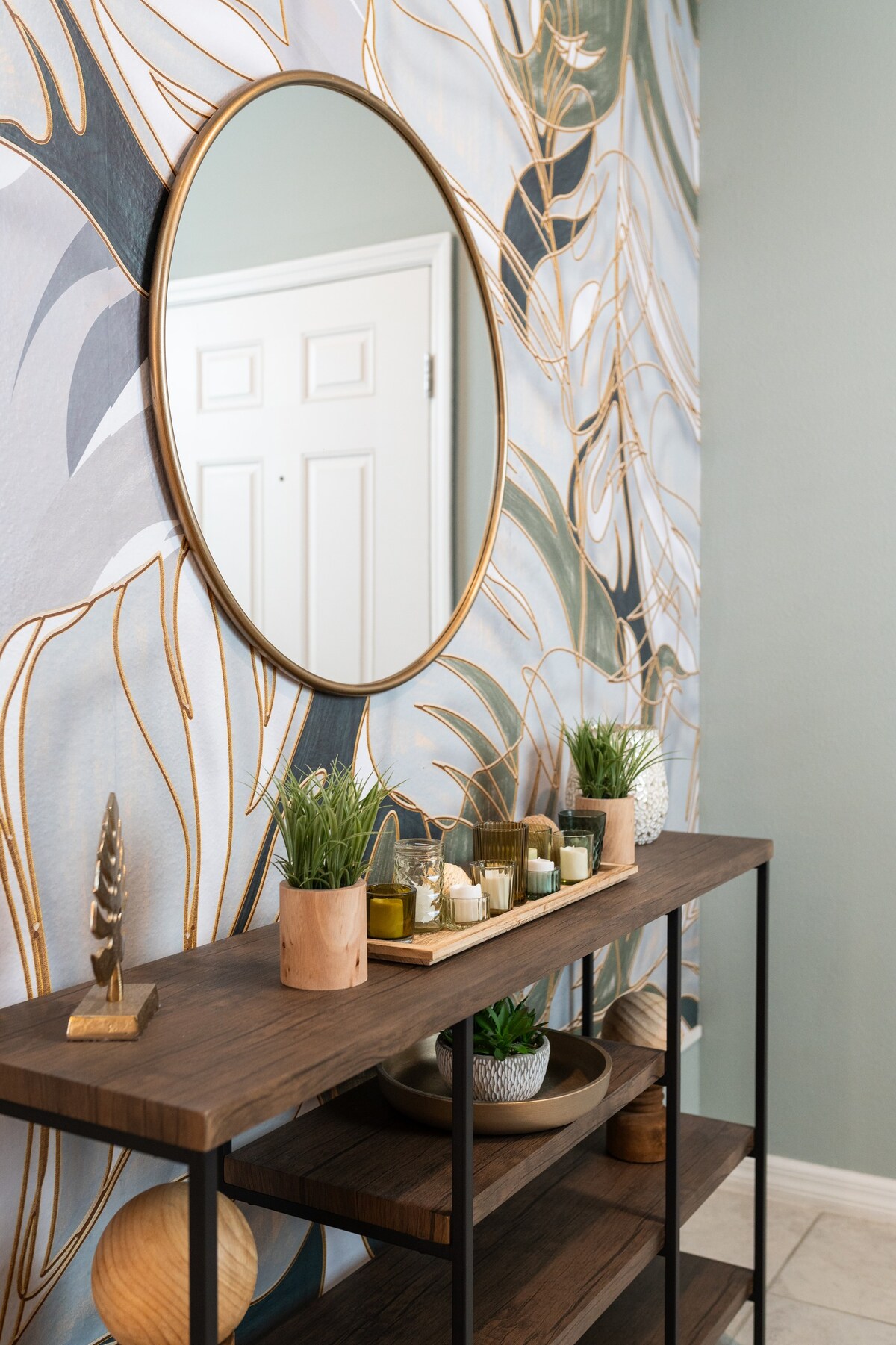 Entry console w/ mirror adds a polished touch to the home’s interior.