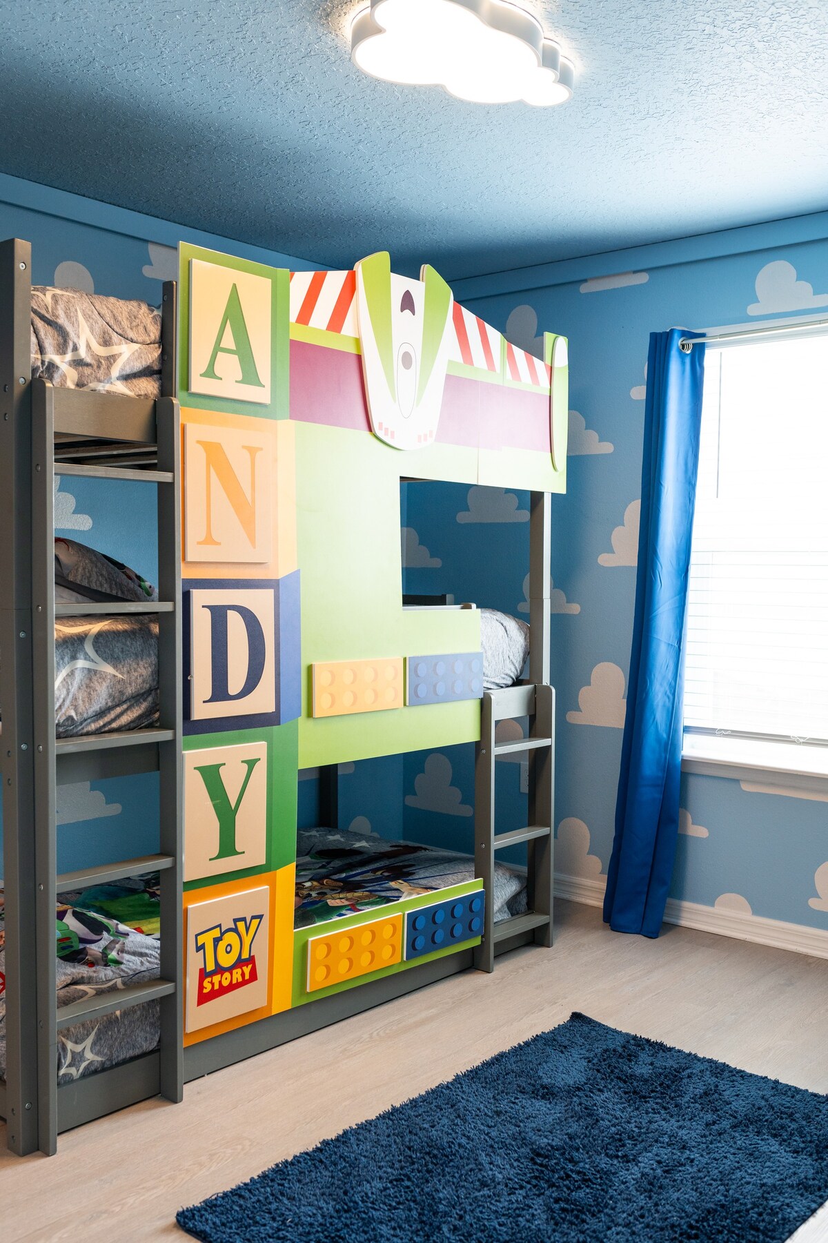 Toy-themed upstairs bedroom brings playful colors and imaginative details.