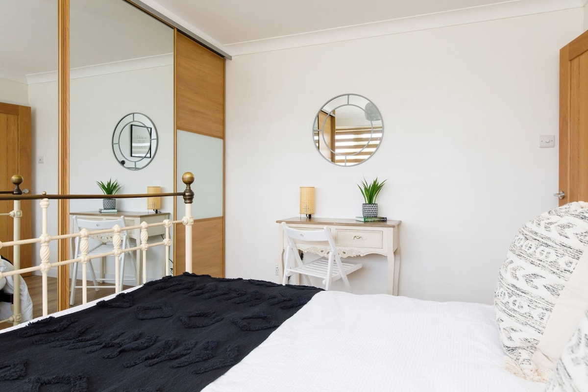 The master bedroom has sliding wardrobe space.