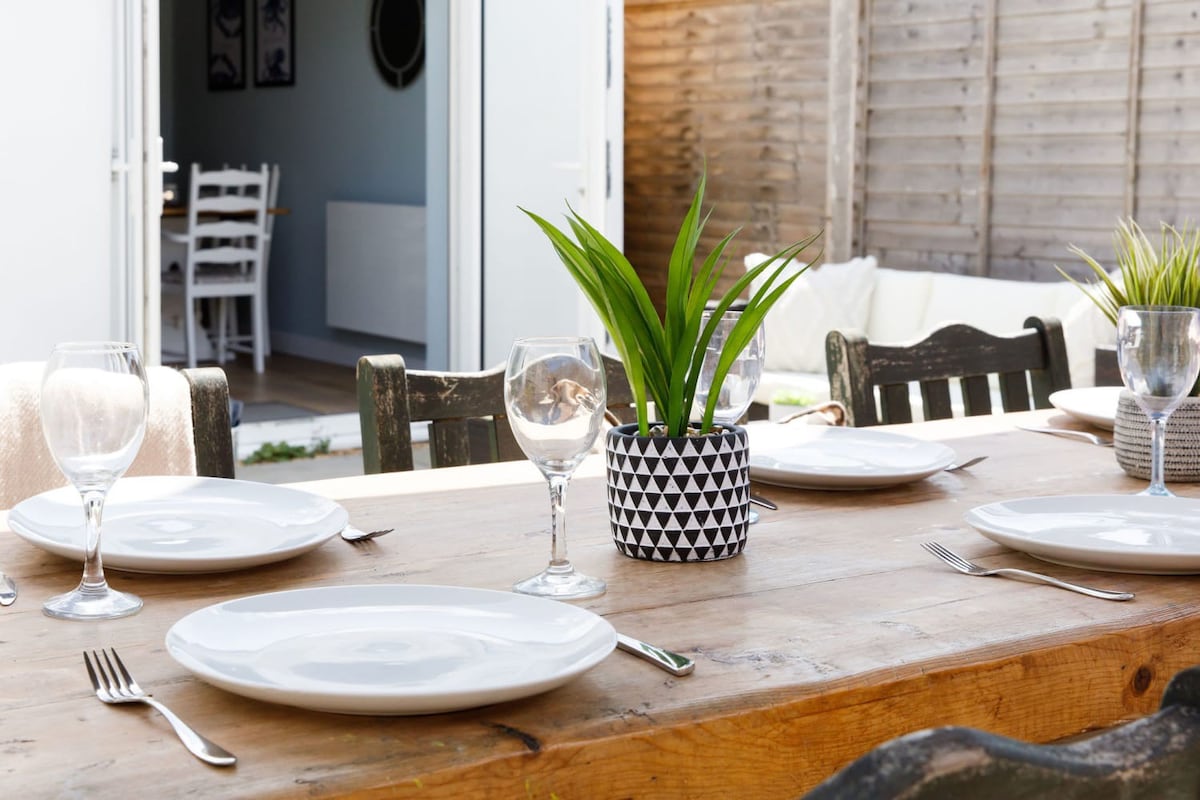 The outdoor dining area is perfectly set up for long evenings eating, drinking and laughing.