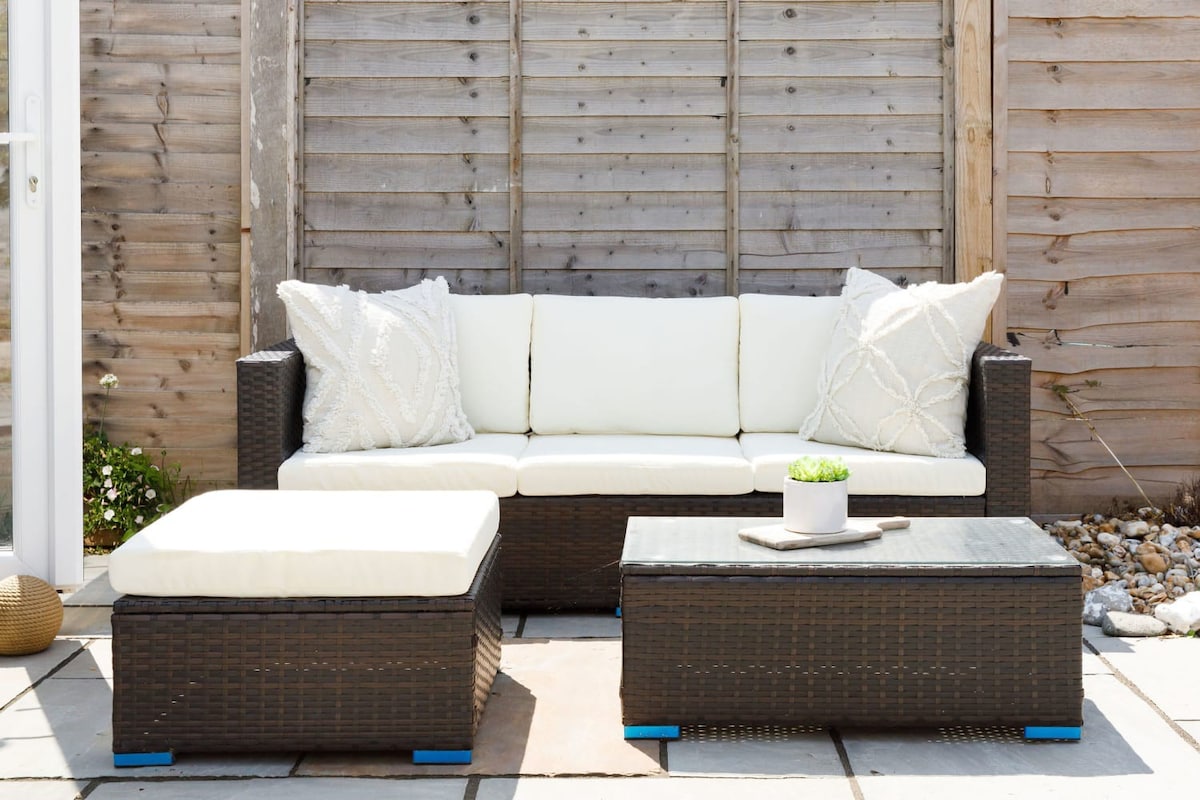 Unwind and relax on the outdoor furniture.