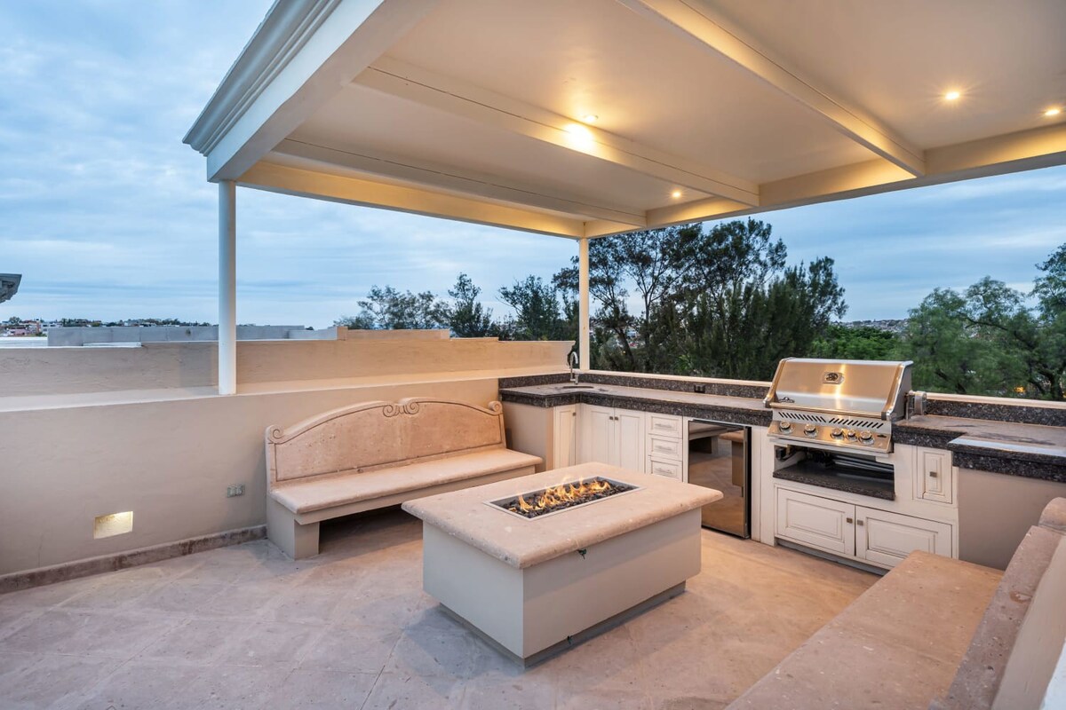 Private rooftop with outdoor kitchen and fire pit
