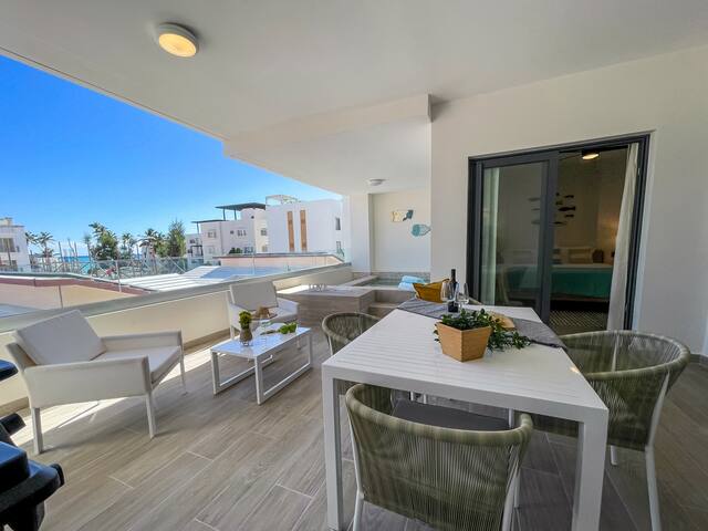 Incredibly Beautiful condo just steps to the beach