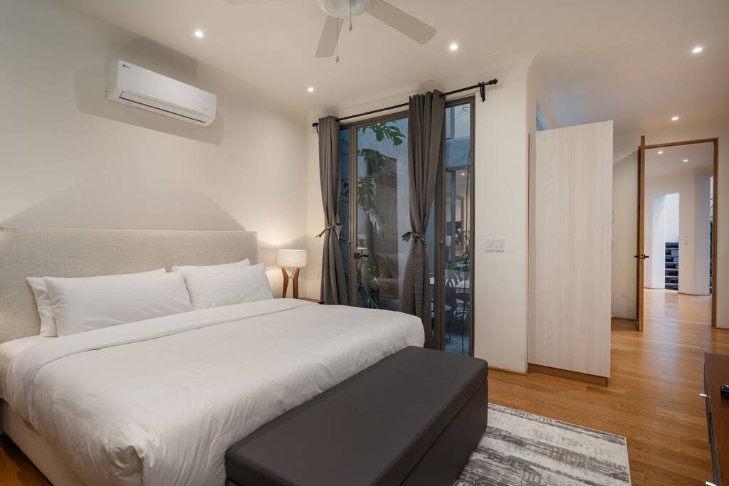 Ground floor bedroom with patio and king size bed