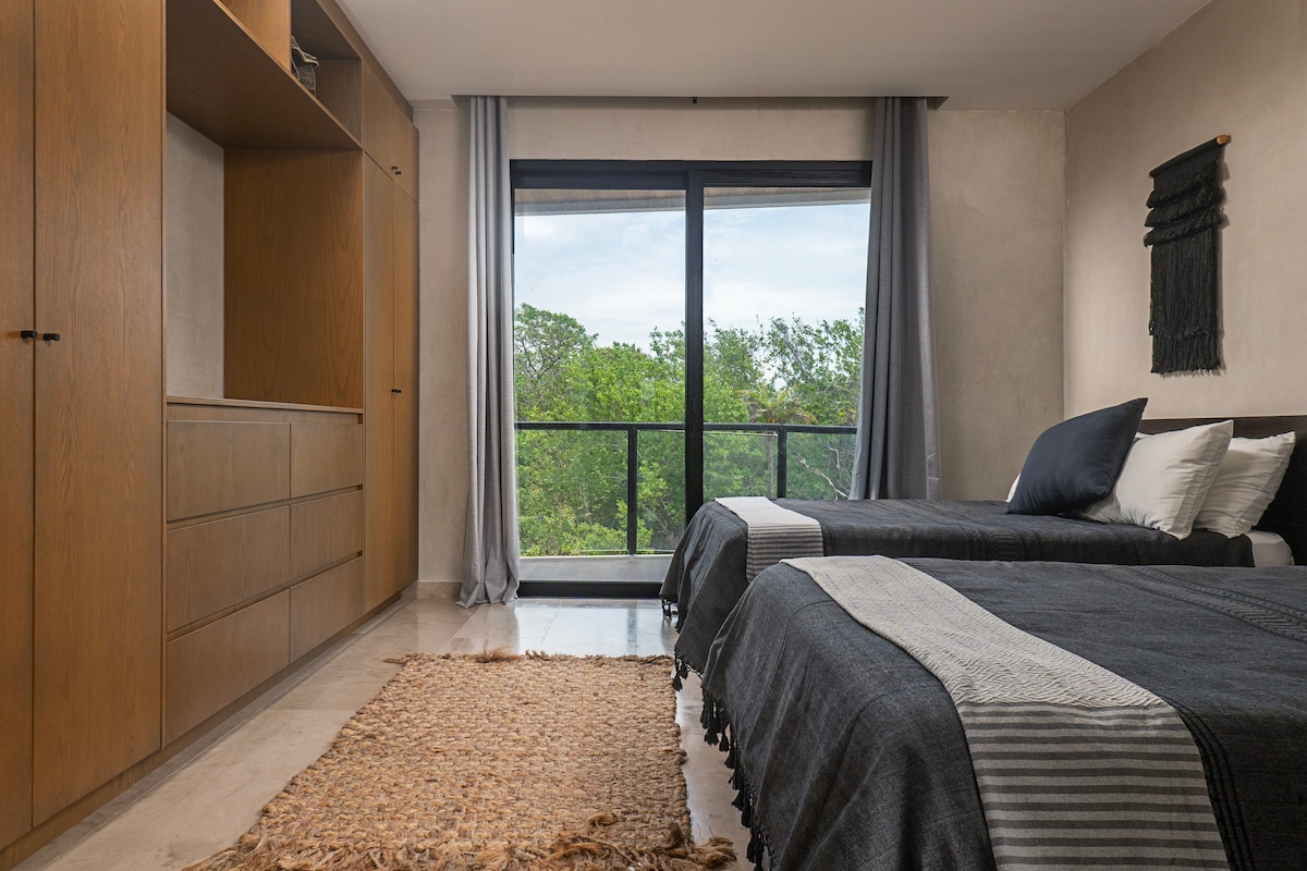 Second bedroom with two comfortable beds.