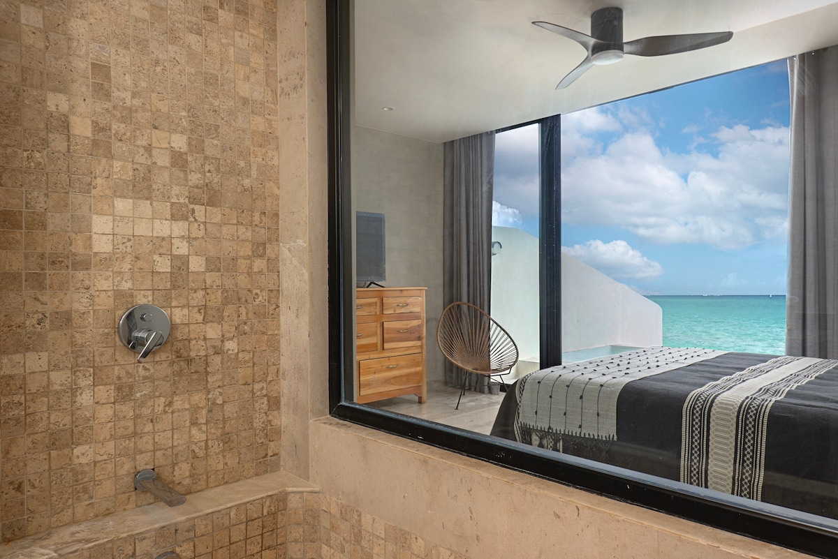 Bathroom with exterior views.
