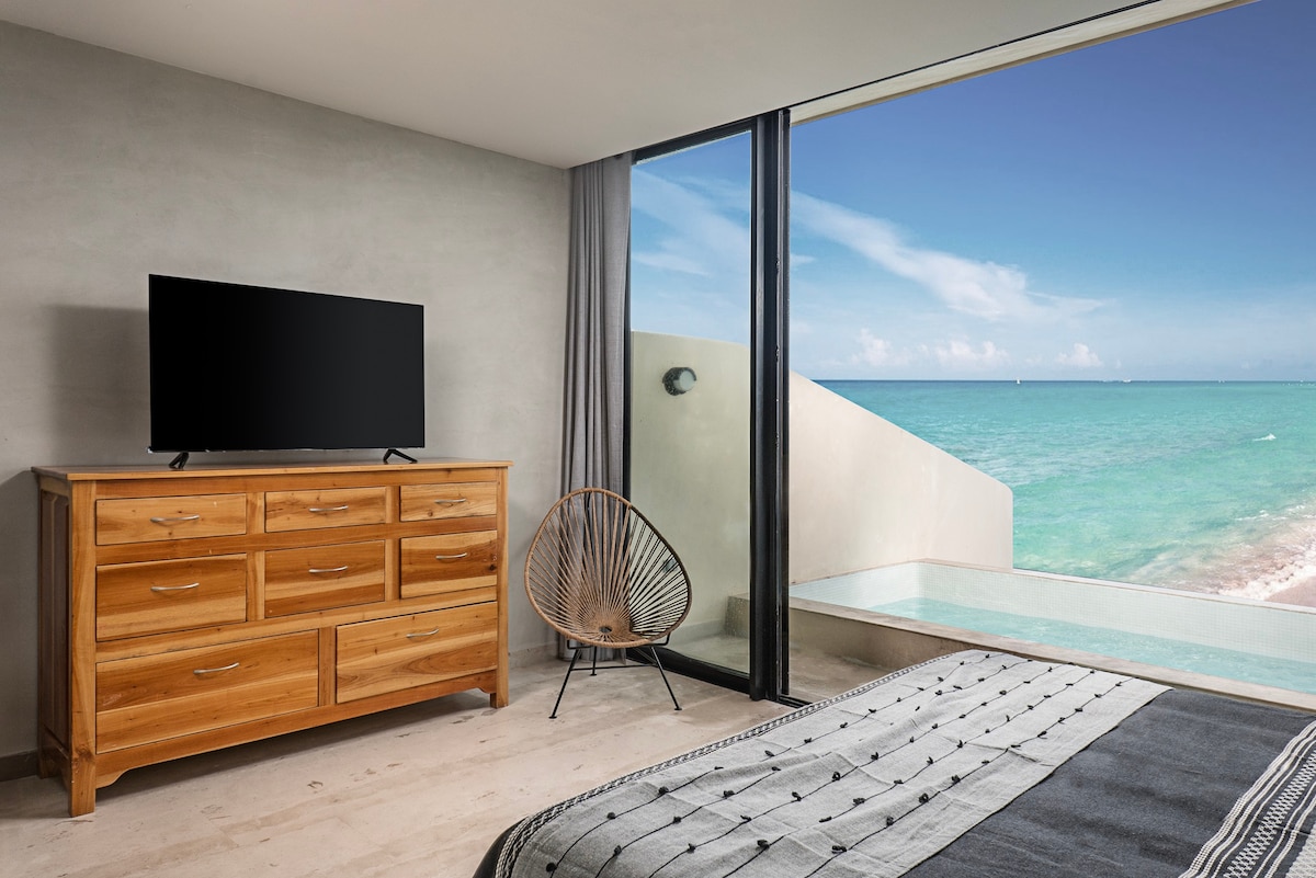 Beautiful room with a comfortable bed and unique ocean views.