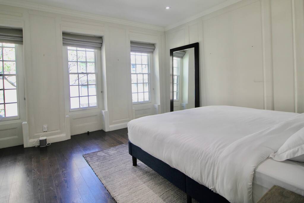 Private, Beautiful Upper Eastside Townhome — 3rd floor guest bedroom. Kingsized bed. Pillowtop innerspring mattress, 50' SUHD Samsung smart TV.