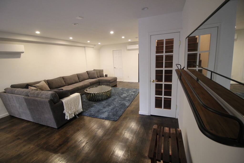 Private, Beautiful Upper Eastside Townhome — Entertainment area. Bob Williams + Mitchell Gold cocktail table.