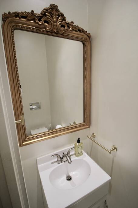 Private, Beautiful Upper Eastside Townhome — Guest Bath - Dining Level