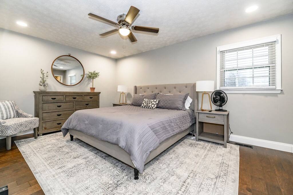 Claim the primary suite and let the king bed do exactly what it promises — this is the room where you'll finally pay off the trip's sleep debt.