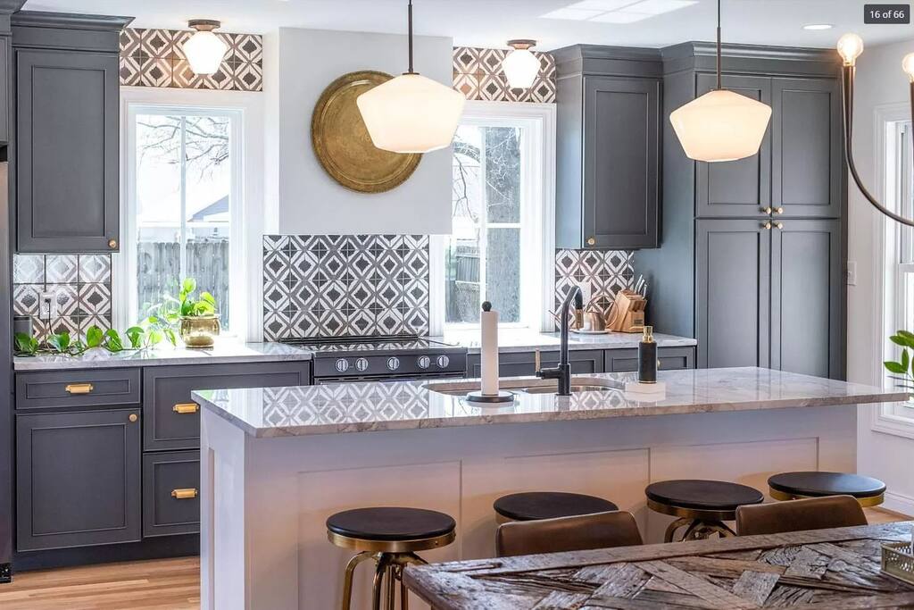 Pour your coffee, pull up a barstool at the island, and let someone else load the dishwasher for once — this kitchen was built for a crowd.