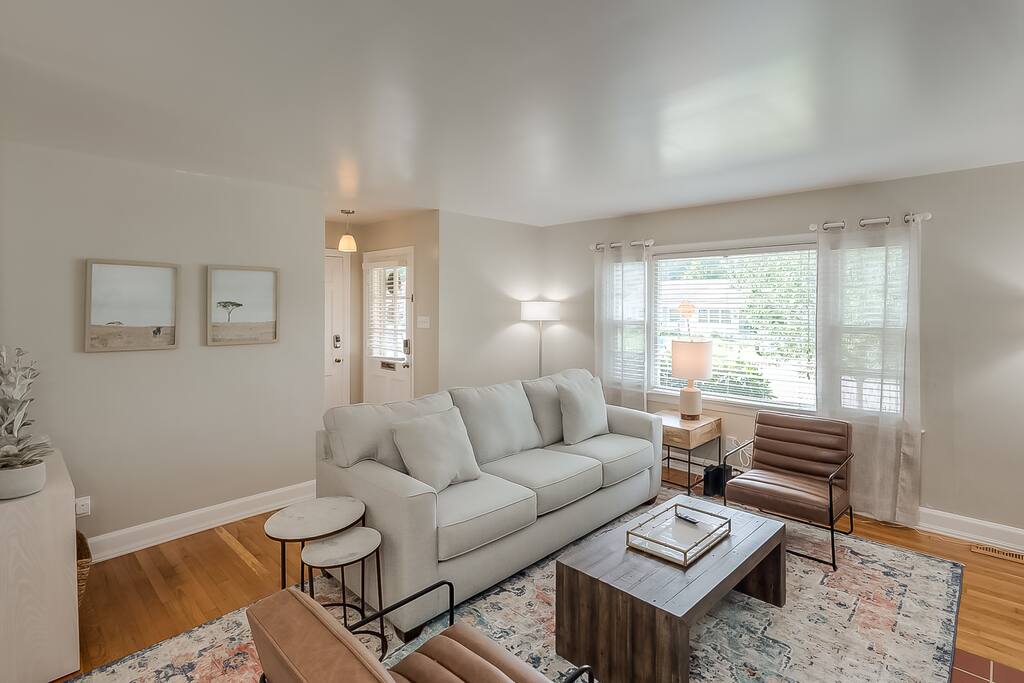 Escape to our charming living room - the perfect spot to relax and unwind during your stay!