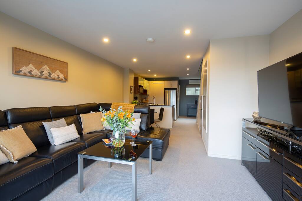 Spacious lounge area in your Queenstown's 2 bedroom accommodation