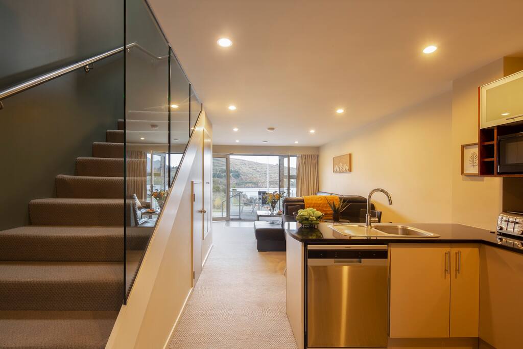 Stairs leading up to bedrooms at luxury accommodation, NZ