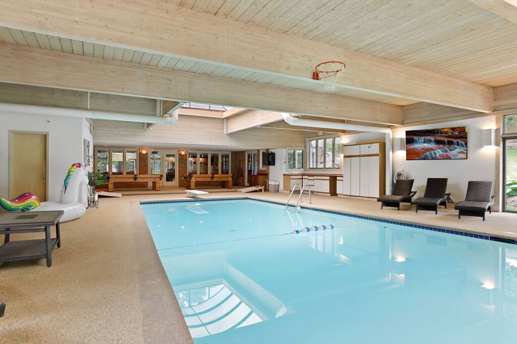 Experience the ultimate in aquatic luxury in this beautifully designed indoor pool that offers a resort like atmosphere in the privacy of your home.