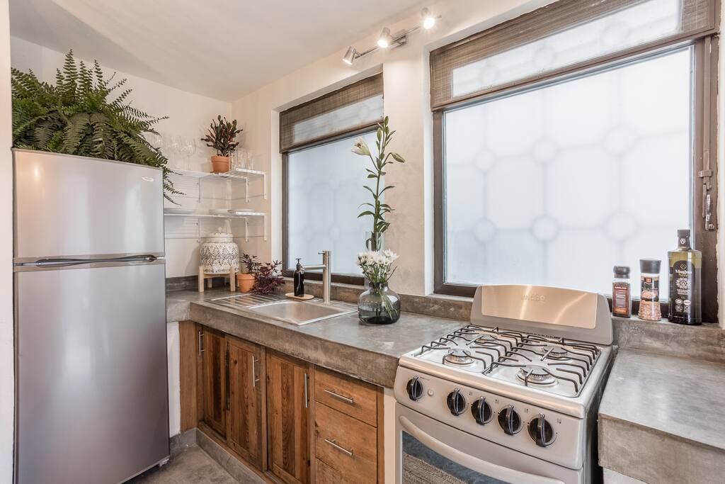 Full Kitchen with Refrigerator and Stove