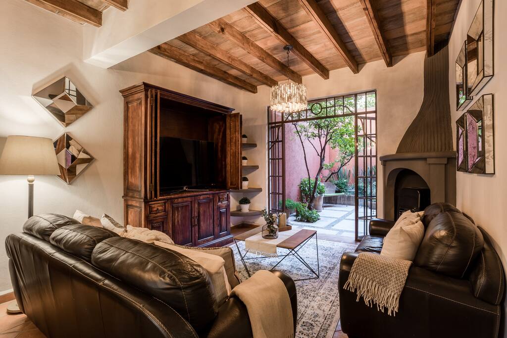 Living Room with Flat Screen TV & Outdoor Garden Patio
