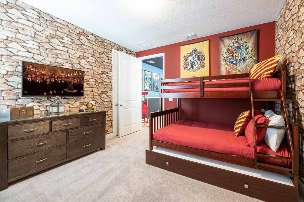 Immerse yourself in a magical stay with themed decor, cozy bunk beds, and enchanting ambiance perfect for fans of all ages!