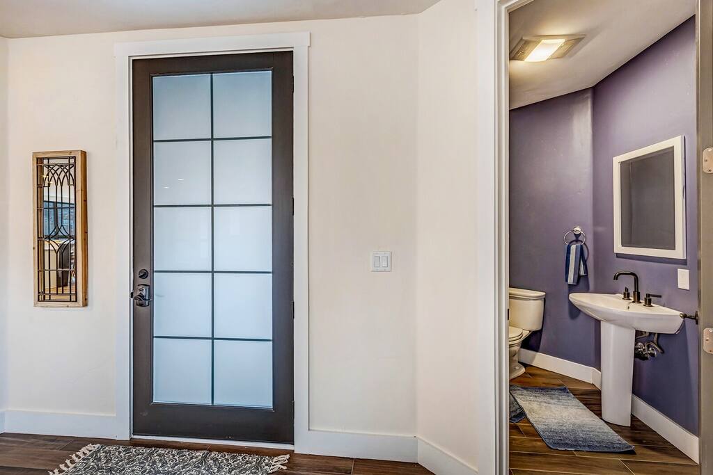 Entry hallway w/ clean lines and a simple, uncluttered design.