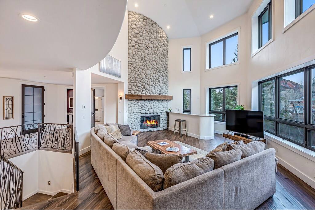 Sunlit lounge area w/ comfortable sofas and an airy, open feel.
