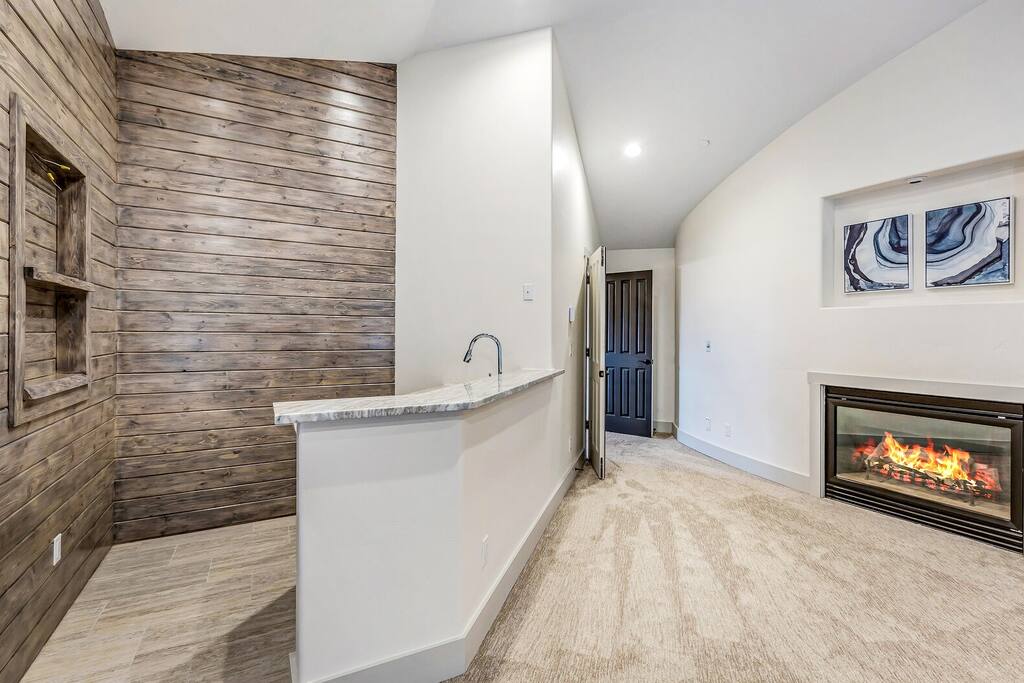 Sleek bathroom w/ a modern sink, tiled shower, and clean lines for a spa-like feel.