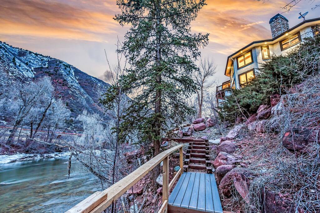 Outdoor path winding through trees with peaceful nature views.