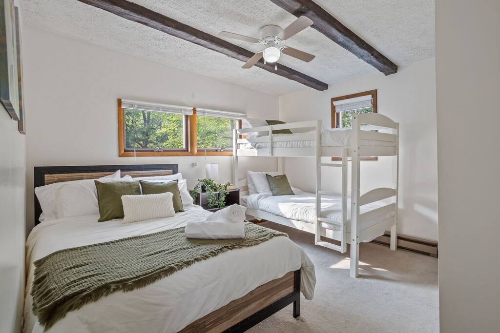 Full Room View
The perfect balance of charm and practicality, this bunk room features comfy beds, big windows, and a cheerful, kid-friendly atmosphere.