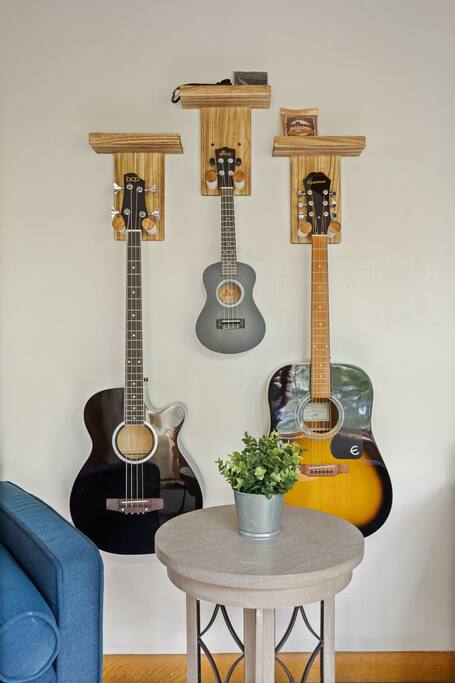 Wall-Mounted Guitars Close-Up
This close-up captures the personality of the space, with each guitar adding a touch of character and charm to the decor.