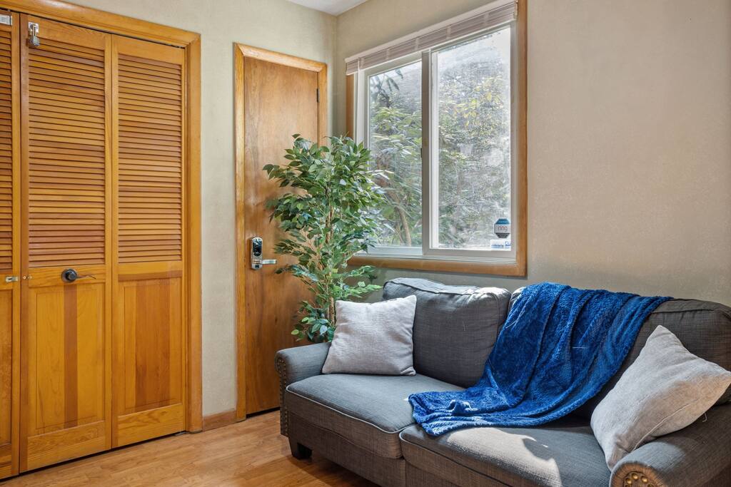 A small, sunny spot perfect for slipping off shoes, reading by the window, or enjoying a quiet moment before heading out.