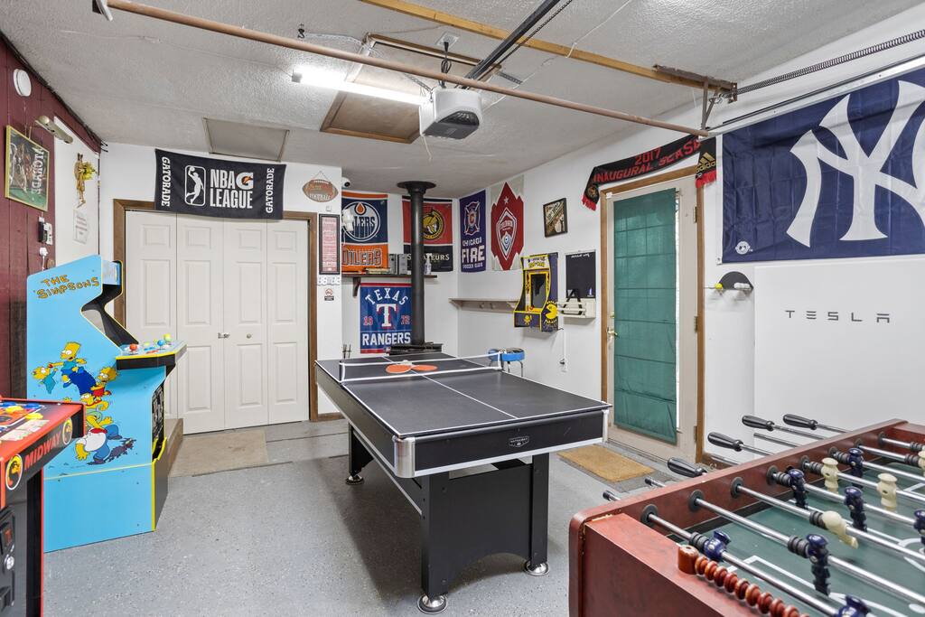 Garage Game Room Overview
From ping pong and foosball to themed décor, this game room packs fun into every corner, perfect for guests of all ages.

(UPDATE: The Simpsons arcade is temporarily out of order until further notice.)