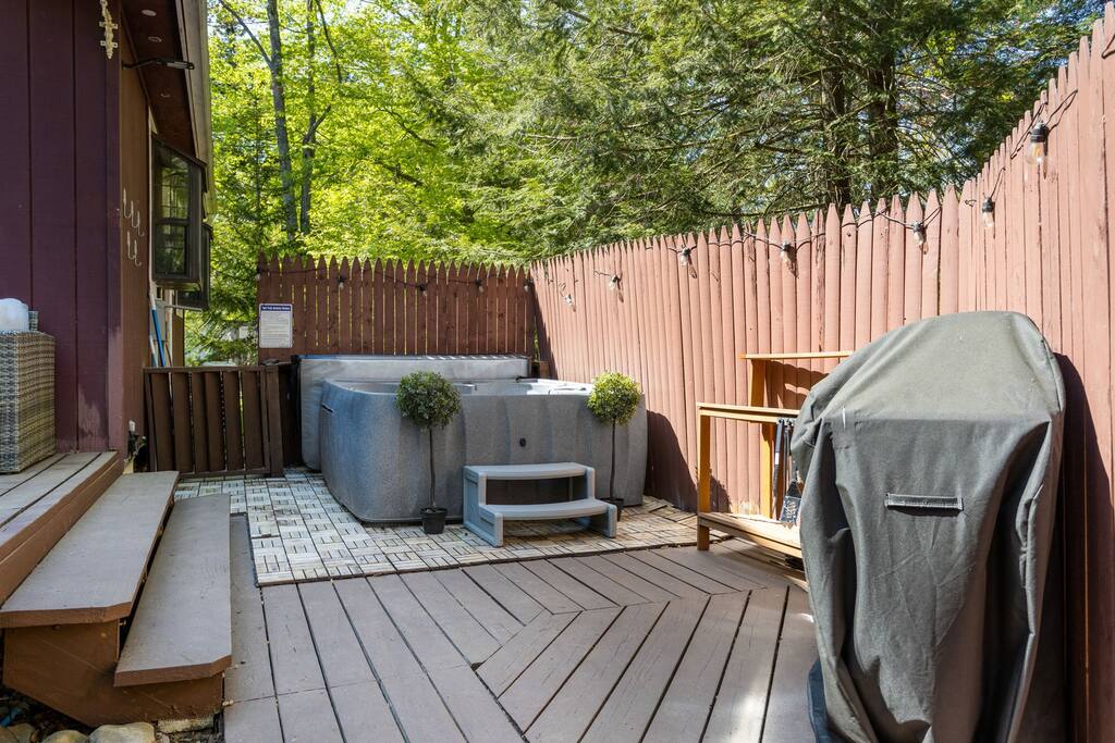 Grill and Lounge Area
This outdoor deck is built for both chill and grill time, cozy lounge seating on one side and a BBQ ready for your next feast.