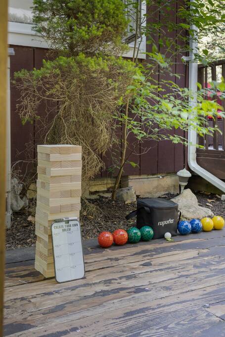Backyard Yard Games Setup
Get competitive or just have fun, this shaded corner includes oversized Jenga, bocce, and more for guests of all ages.