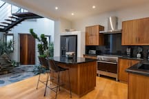 Full-size kitchen, fully-equipped with modern appliances and kitchen essentials