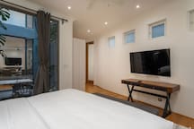 Ground floor bedroom with patio and king size bed