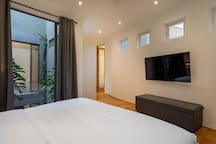 Bedroom with king bed & TV