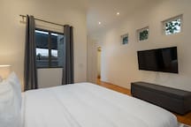 Bedroom with king bed & TV