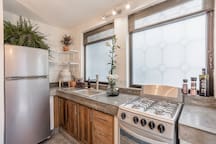 Full Kitchen with Refrigerator and Stove