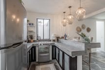 Full-Size Kitchen with Refrigerator, Stove and Oven